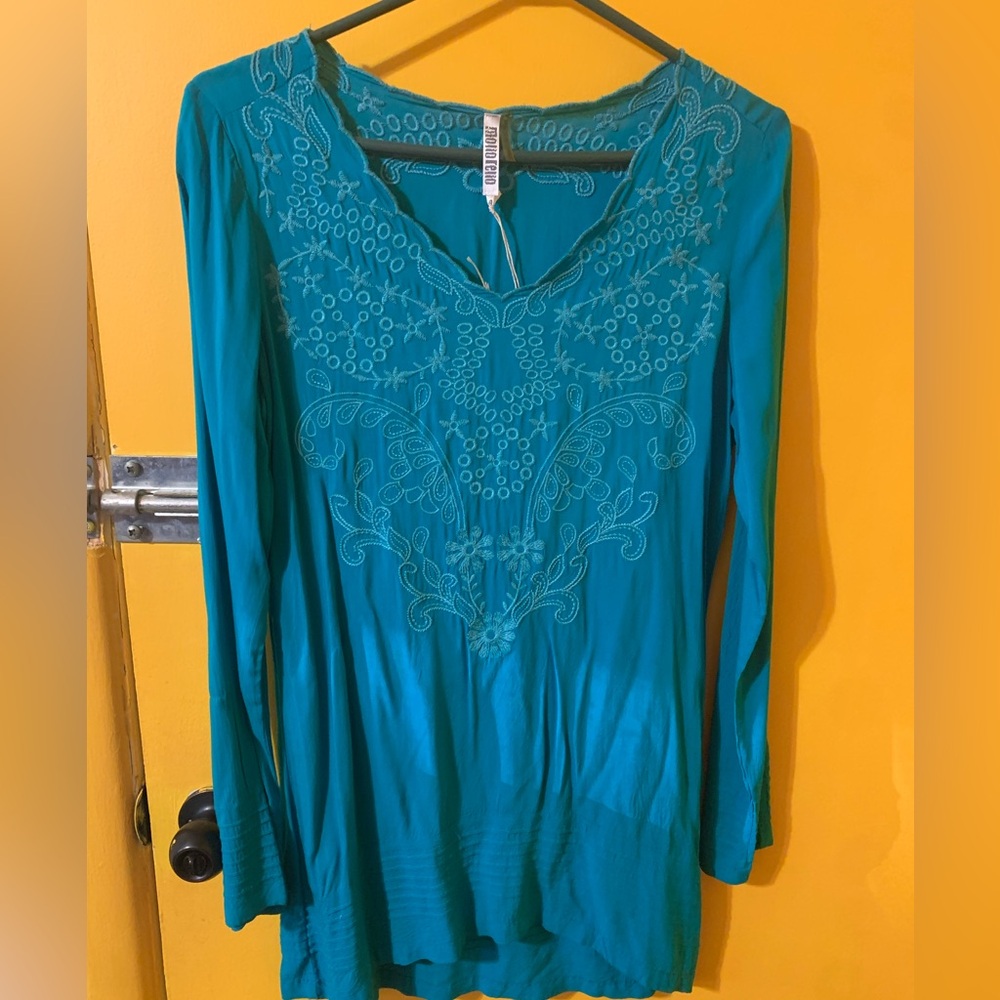 Blue long cotton pull over blouse.